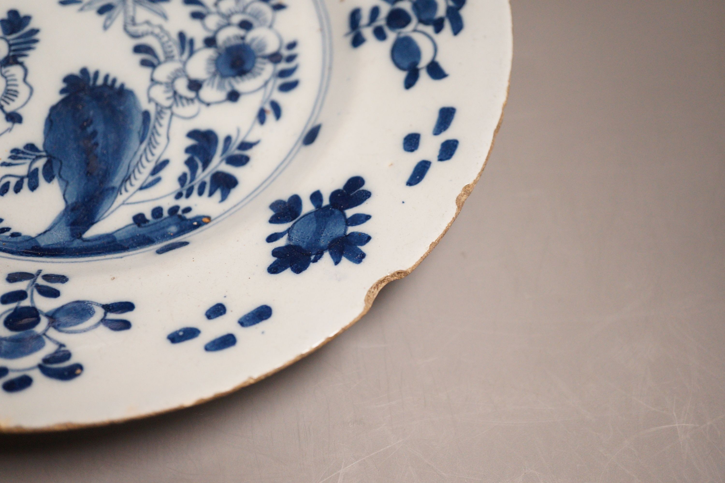 An 18th century Delft blue and white vase, a similar plate and two papier mache boxes, plate diameter 23cm
